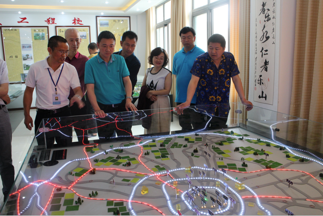 九龙县教育体育局考察团到我校参观交流